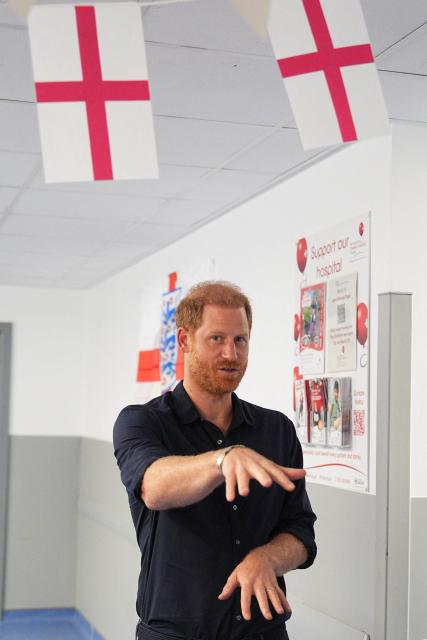 Britain's Prince Harry, Duke of Sussex, visits the Birmingham Children’s Hospital in the city of Birmingham, central England, on July 9, 2026, to celebrate the 20th anniversary of the very first WellChild Nurse. (Photo by Aaron Chown / POOL / AFP)
