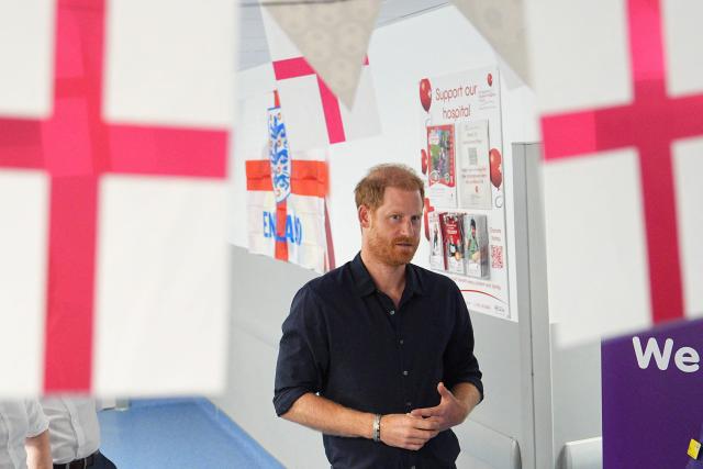 Britain's Prince Harry, Duke of Sussex, visits the Birmingham Children’s Hospital in the city of Birmingham, central England, on July 9, 2026, to celebrate the 20th anniversary of the very first WellChild Nurse. (Photo by Aaron Chown / POOL / AFP)
