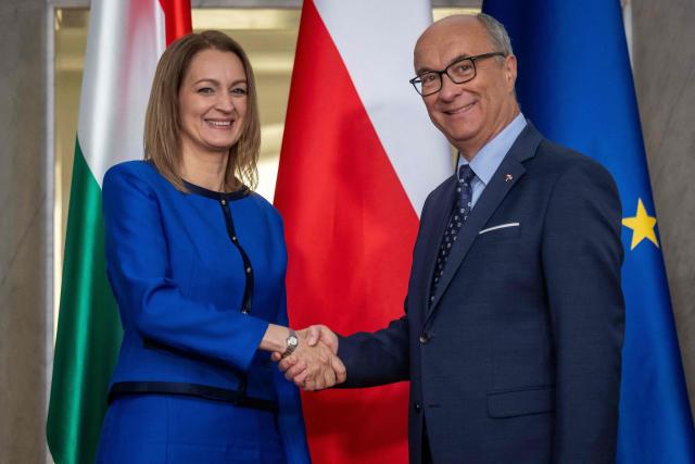 Hungary's Parliament Speaker Agnes Forsthoffer (L) and Poland's Parliament Speaker Wlodzimierz Czarzasty shake hands during their meeting at the Polish Parliament in Warsaw on July 9, 2026. (Photo by Wojtek RADWANSKI / AFP)