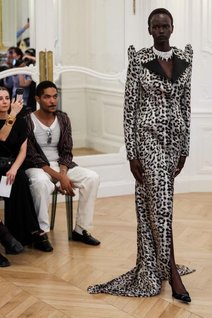 A model presents a creation by Peet Dullaert for the Women Haute Couture Fall/Winter 2026-2027 collection fashion show as part of the Paris Fashion Week, in Paris, on July 9, 2026. (Photo by Kenzo TRIBOUILLARD / AFP)