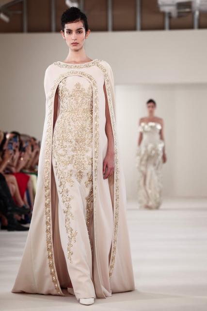 A model presents a creation by Rami Al Ali for the Women Haute Couture Fall/Winter 2026-2027 collection as part of the Paris Fashion Week, in Paris, on July 9, 2026. (Photo by Behrouz MEHRI / AFP)