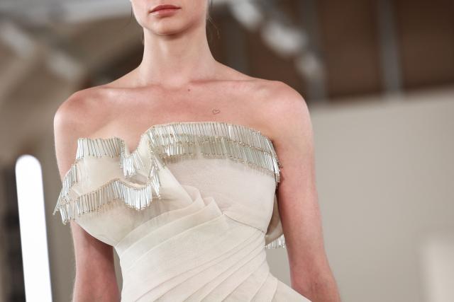 A model presents a creation by Rami Al Ali for the Women Haute Couture Fall/Winter 2026-2027 collection as part of the Paris Fashion Week, in Paris, on July 9, 2026. (Photo by Behrouz MEHRI / AFP)