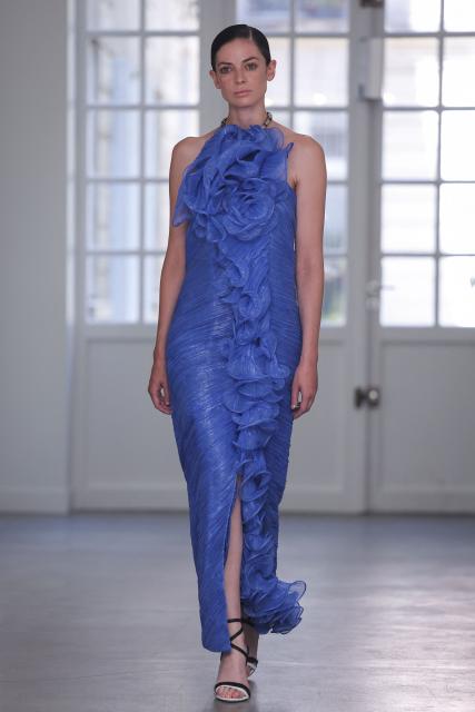 A model presents a creation for Aelis for the Women Haute Couture Fall/Winter 2026-2027 collection as part of the Paris Fashion Week, in Paris, on July 9, 2026. (Photo by Kenzo TRIBOUILLARD / AFP)