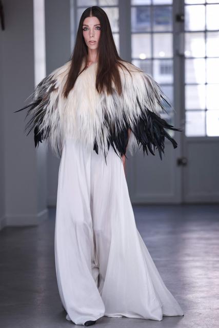 A model presents a creation for Aelis for the Women Haute Couture Fall/Winter 2026-2027 collection as part of the Paris Fashion Week, in Paris, on July 9, 2026. (Photo by Kenzo TRIBOUILLARD / AFP)