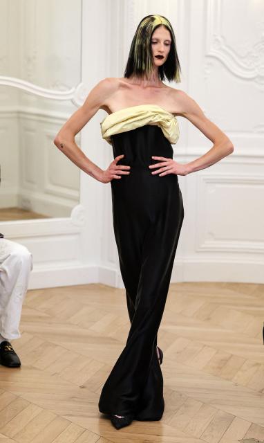 A model presents a creation by Peet Dullaert for the Women Haute Couture Fall/Winter 2026-2027 collection fashion show as part of the Paris Fashion Week, in Paris, on July 9, 2026. (Photo by Kenzo TRIBOUILLARD / AFP)