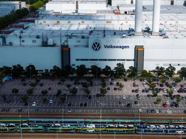 Clouds gather over the Zwickau Volkswagen Plant on July 9, 2026 at the Zwickau, eastern Germany. Volkswagen workers staged protests nationwide on July 9 as unions warned of "major conflict" if the struggling German car giant pushes ahead with what could be the global auto industry's biggest restructuring. (Photo by AFP)