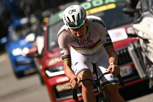 UAE Team Emirates - XRG's Slovenian rider Tadej Pogacar cycles in a lone breakaway in the final kilometers during the 6th stage of the 113th edition of the Tour de France cycling race, 186,2 km between Pau and Gavarnie-Gèdre in the French Pyrenees, on July 9, 2026. (Photo by Jeff PACHOUD / AFP)