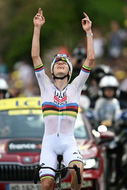 UAE Team Emirates - XRG's Slovenian rider Tadej Pogacar cycles to the finish line to win the 6th stage of the 113th edition of the Tour de France cycling race, 186 km between Pau and Gavarnie-Gèdre in the French Pyrenees, on July 9, 2026. (Photo by Loic VENANCE / AFP)