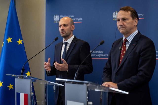 France's Minister of Foreign Affairs Jean-Noel Barrot (L) and Poland's Deputy Prime Minister and Minister of Foreign Affairs Radoslaw Sikorski address a joint press conference after Barrot participated as guest of honour in the annual Heads of Diplomatic Missions Conference in Warsaw on 09 July, 2026 (Photo by Wojtek RADWANSKI / AFP)