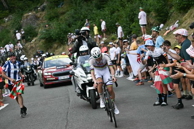 UAE Team Emirates - XRG's Slovenian rider Tadej Pogacar cycles in a lone breakaway in the final kilometers to win the 6th stage of the 113th edition of the Tour de France cycling race, 186 km between Pau and Gavarnie-Gèdre in the French Pyrenees, on July 9, 2026. (Photo by Jeff PACHOUD / AFP)