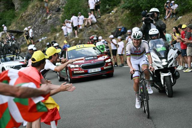 UAE Team Emirates - XRG's Slovenian rider Tadej Pogacar cycles in a lone breakaway in the final kilometers to win the 6th stage of the 113th edition of the Tour de France cycling race, 186 km between Pau and Gavarnie-Gèdre in the French Pyrenees, on July 9, 2026. (Photo by Jeff PACHOUD / AFP)