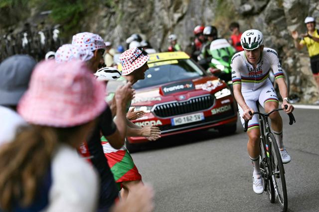 UAE Team Emirates - XRG's Slovenian rider Tadej Pogacar cycles in a lone breakaway in the final kilometers to win the 6th stage of the 113th edition of the Tour de France cycling race, 186 km between Pau and Gavarnie-Gèdre in the French Pyrenees, on July 9, 2026. (Photo by Jeff PACHOUD / AFP)