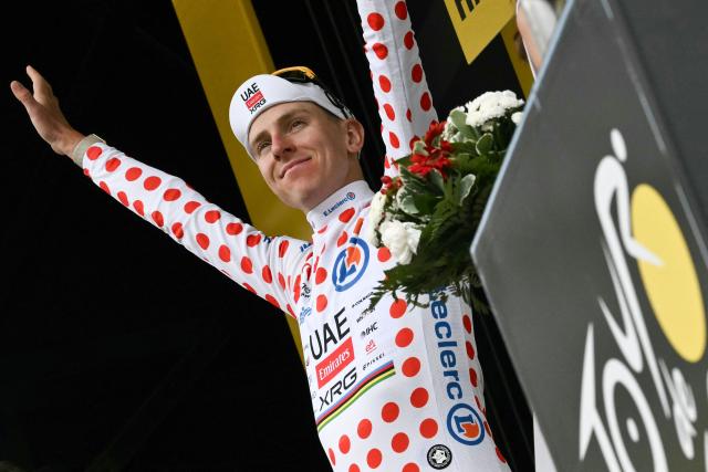 UAE Team Emirates - XRG's Slovenian rider Tadej Pogacar celebrates on the podium with the best climber's polka dot (dotted) jersey after the 6th stage of the 113th edition of the Tour de France cycling race, 186 km between Pau and Gavarnie-Gèdre in the French Pyrenees, on July 9, 2026. (Photo by Jeff PACHOUD / AFP)