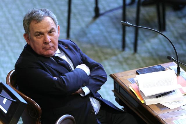 (FILES) French lawyer, member of the Council of Paris Francis Szpiner attends mayor of Paris' last city council session at the Hotel de Ville in Paris on February 9, 2026, before the 2026 municipal elections. Senator (LR) and lawyer Francis Szpiner, suspected of having allocated a social housing unit to a woman in exchange for sexual relations when he was mayor of the 16th arrondissement, has been placed under formal investigation for passive corruption, the Paris public prosecutor's office said on July 9, 2026. (Photo by Thomas SAMSON / AFP)
