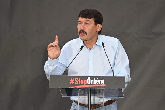 Former Hungarian President Janos Ader speaks during a demonstration of supporters of the former government party-coalition Fidesz–KDNP (Fidesz – Hungarian Civic Alliance and the Christian Democratic People's Party (KDNP) with the motto 'Put an End to Arbitrariness!' in Budapest on July 09, 2026. According to the organisers, the aim of the demonstration is to protest against the 17th Amendment to the Fundamental Law initiated by the Tisza government, which would affect several public offices, including the position of President of the Republic Tamas Sulyok. (Photo by Attila KISBENEDEK / AFP)