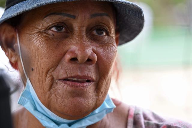 Alicia Maria del Rosario is asissted at Japan's military field hospital in Caribe, La Guaira state, Venezuela on July 9, 2026, following the June 24 twin earthquakes. The United Nations launched an urgent appeal on July 8, 2026 for nearly $300 million towards Venezuela earthquake relief operations as the death toll from the disaster rose to more than 3,800 people. (Photo by Raul ARBOLEDA / AFP)