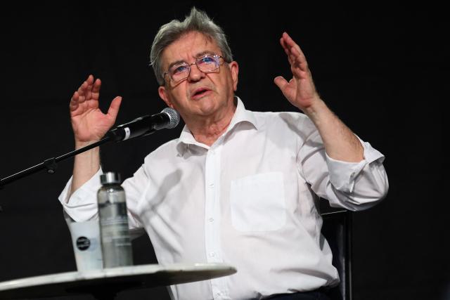French left-wing party La France Insoumise (LFI) founder and presidential election candidate Jean-Luc Melenchon gestures as he delivers a speech during a public interview at the "Village du Off" of the Avignon Off Festival in Avignon on July 9, 2026. (Photo by Clement MAHOUDEAU / AFP)