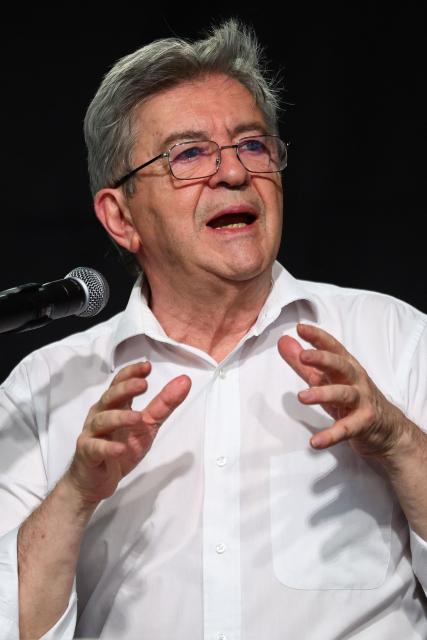 French left-wing party La France Insoumise (LFI) founder and presidential election candidate Jean-Luc Melenchon gestures as he delivers a speech during a public interview at the "Village du Off" of the Avignon Off Festival in Avignon on July 9, 2026. (Photo by Clement MAHOUDEAU / AFP)