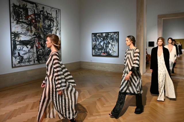 Models walk the runway during Fendi's first Women Haute Couture Fall/Winter 2026-2027 collection at the National Gallery of Modern and Contemporary Art in Rome on July 9, 2026. Fendi celebrates the first haute couture show by newly seated designer Maria Grazia Chiuri in its home city of Rome along with a homage to longtime couturier Karl Lagerfeld. (Photo by Alberto PIZZOLI / AFP)