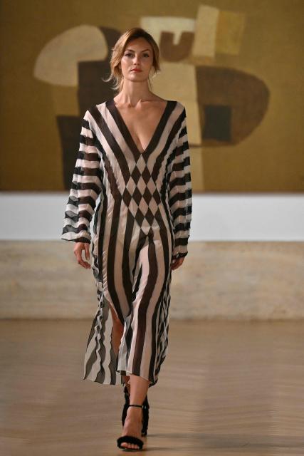 A model walks the runway during Fendi's first Women Haute Couture Fall/Winter 2026-2027 collection at the National Gallery of Modern and Contemporary Art in Rome on July 9, 2026. Fendi celebrates the first haute couture show by newly seated designer Maria Grazia Chiuri in its home city of Rome along with a homage to longtime couturier Karl Lagerfeld. (Photo by Alberto PIZZOLI / AFP)