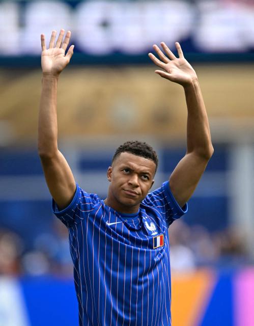 France's forward #10 Kylian Mbappe waves to the crowd ahead of the 2026 World Cup football tournament quarter-final match between France and Morocco at Boston Stadium in Foxborough on July 9, 2026.  (Photo by MAURO PIMENTEL / AFP)