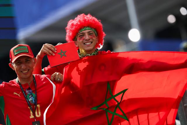 Moroccan fans cheer for their team ahead of the 2026 World Cup football tournament quarter-final match between France and Morocco at Boston Stadium in Foxborough on July 9, 2026.  (Photo by FRANCK FIFE / AFP)