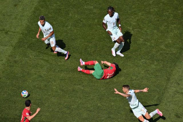 Morocco's forward #10 Brahim Diaz falls on the pitch during the 2026 World Cup football tournament quarter-final match between France and Morocco at Boston Stadium in Foxborough on July 9, 2026.  (Photo by ANGELA WEISS / AFP)