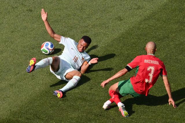 France's forward #10 Kylian Mbappe falls after being fouled by Morocco's defender #03 Noussair Mazraoui during the 2026 World Cup football tournament quarter-final match between France and Morocco at Boston Stadium in Foxborough on July 9, 2026.  (Photo by ANGELA WEISS / AFP)