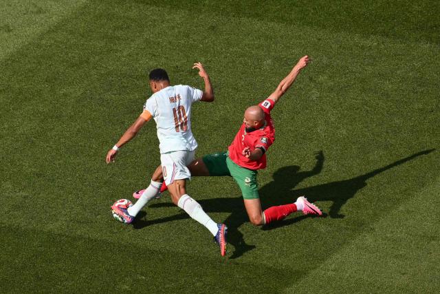 France's forward #10 Kylian Mbappe and Morocco's defender #03 Noussair Mazraoui fight for the ball during the 2026 World Cup football tournament quarter-final match between France and Morocco at Boston Stadium in Foxborough on July 9, 2026.  (Photo by ANGELA WEISS / AFP)