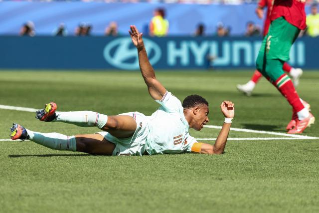 France's forward #10 Kylian Mbappe reacts after being fouled by Morocco's defender #03 Noussair Mazraoui (unseen) to concede a penalty during the 2026 World Cup football tournament quarter-final match between France and Morocco at Boston Stadium in Foxborough on July 9, 2026.  (Photo by FRANCK FIFE / AFP)