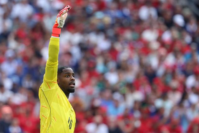 France's goalkeeper #16 Mike Maignan reacts during the 2026 World Cup football tournament quarter-final match between France and Morocco at Boston Stadium in Foxborough on July 9, 2026.  (Photo by Odd ANDERSEN / AFP)