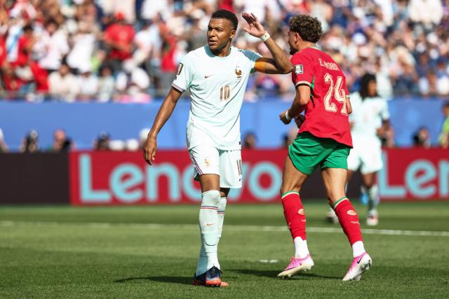 France's forward #10 Kylian Mbappe reacts to a missed penalty kick during the 2026 World Cup football tournament quarter-final match between France and Morocco at Boston Stadium in Foxborough on July 9, 2026.  (Photo by FRANCK FIFE / AFP)