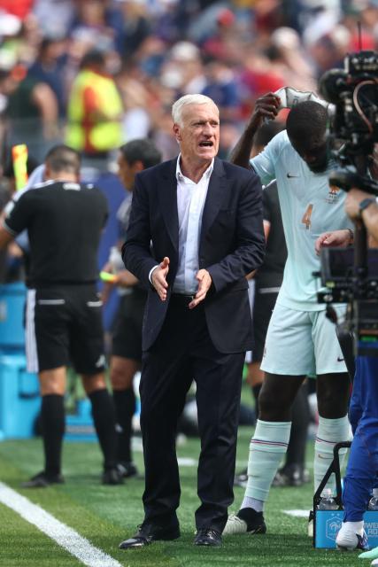 France's head coach Didier Deschamps gestures on the touchline during the 2026 World Cup football tournament quarter-final match between France and Morocco at Boston Stadium in Foxborough on July 9, 2026.  (Photo by FRANCK FIFE / AFP)