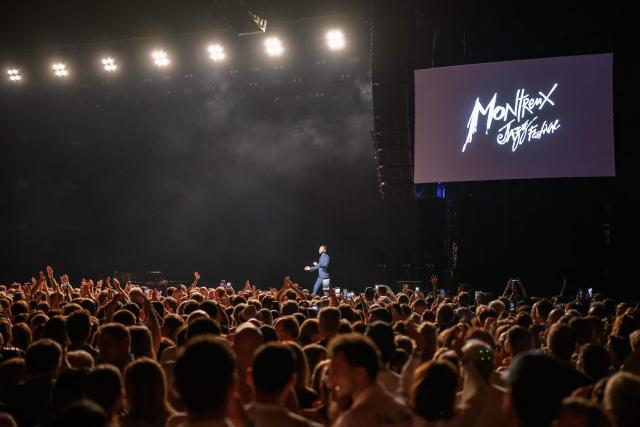 US singer, songwriter and pianist John Legend arrives on stage to perform during the 60th Montreux Jazz Festival, in Montreux on July 9, 2026. (Photo by Fabrice COFFRINI / AFP)