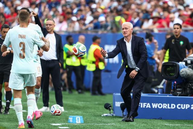 France's head coach Didier Deschamps throws the ball during the 2026 World Cup football tournament quarter-final match between France and Morocco at Boston Stadium in Foxborough on July 9, 2026.  (Photo by FRANCK FIFE / AFP)