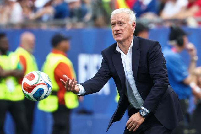 France's head coach Didier Deschamps throws the ball during the 2026 World Cup football tournament quarter-final match between France and Morocco at Boston Stadium in Foxborough on July 9, 2026.  (Photo by FRANCK FIFE / AFP)