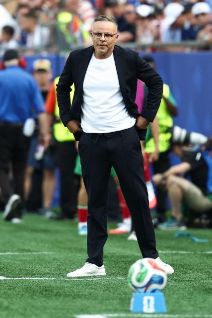 Morocco's head coach Mohamed Ouahbi watches his players from the touchline during the 2026 World Cup football tournament quarter-final match between France and Morocco at Boston Stadium in Foxborough on July 9, 2026.  (Photo by FRANCK FIFE / AFP)