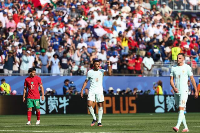 France's forward #10 Kylian Mbappe celebrates scoring his team's first goal during the 2026 World Cup football tournament quarter-final match between France and Morocco at Boston Stadium in Foxborough on July 9, 2026.  (Photo by FRANCK FIFE / AFP)