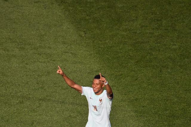 France's forward #10 Kylian Mbappe celebrates scoring his team's first goal during the 2026 World Cup football tournament quarter-final match between France and Morocco at Boston Stadium in Foxborough on July 9, 2026.  (Photo by ANGELA WEISS / AFP)