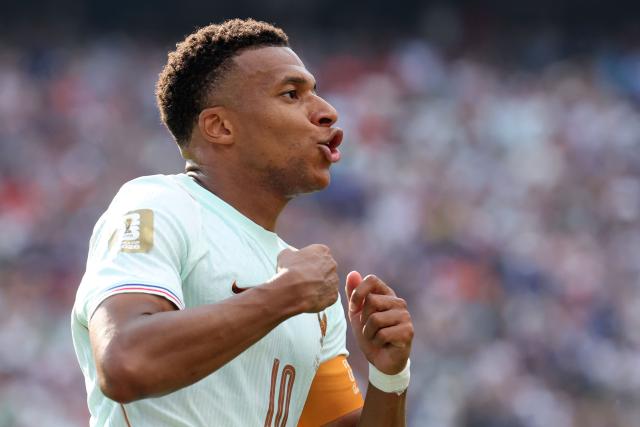 France's forward #10 Kylian Mbappe celebrates scoring his team's first goal during the 2026 World Cup football tournament quarter-final match between France and Morocco at Boston Stadium in Foxborough on July 9, 2026.  (Photo by Odd ANDERSEN / AFP)