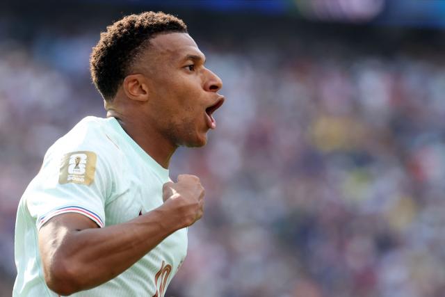 France's forward #10 Kylian Mbappe celebrates scoring his team's first goal during the 2026 World Cup football tournament quarter-final match between France and Morocco at Boston Stadium in Foxborough on July 9, 2026.  (Photo by Odd ANDERSEN / AFP)