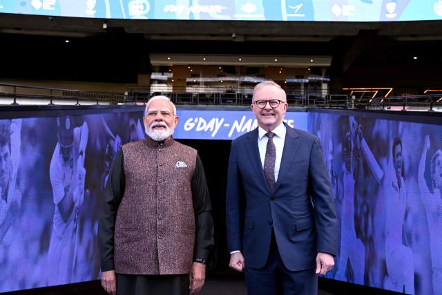 Indian Prime Minister Narendra Modi (L) stands with Australia’s Prime Minister Anthony Albanese during a visit to the Melbourne Cricket Ground (MCG) on July 10, 2026. (Photo by WILLIAM WEST / AFP)