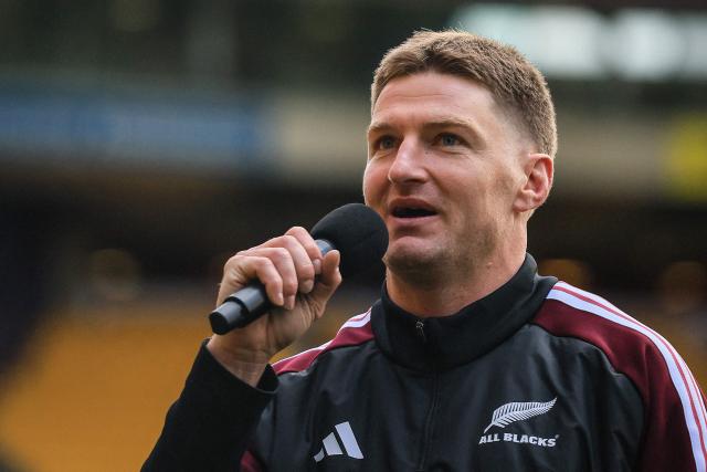 New Zealand's Jordie Barrett speaks to fans after the captain's run training session in Wellington on July 10, 2026, ahead of the rugby Nations Championship match against Italy. (Photo by Grant Down / AFP)