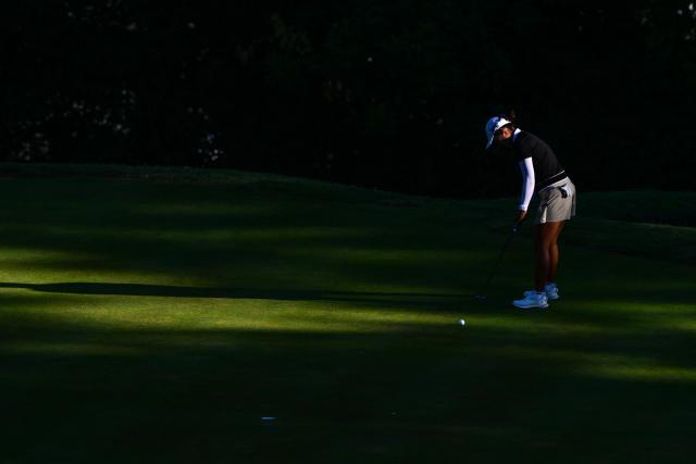 Republic of Korea Minji Kang competes during the second round of the Amundi Evian Championship at Evian Resort Golf Club, in Evian-Les-Bains, center eastern France on July 9, 2026. (Photo by OLIVIER CHASSIGNOLE / AFP)