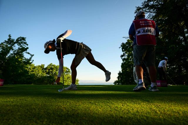 Republic of Korea Minji Kang prepares to compete during the second round of the Amundi Evian Championship at Evian Resort Golf Club, in Evian-Les-Bains, center eastern France on July 9, 2026. (Photo by OLIVIER CHASSIGNOLE / AFP)