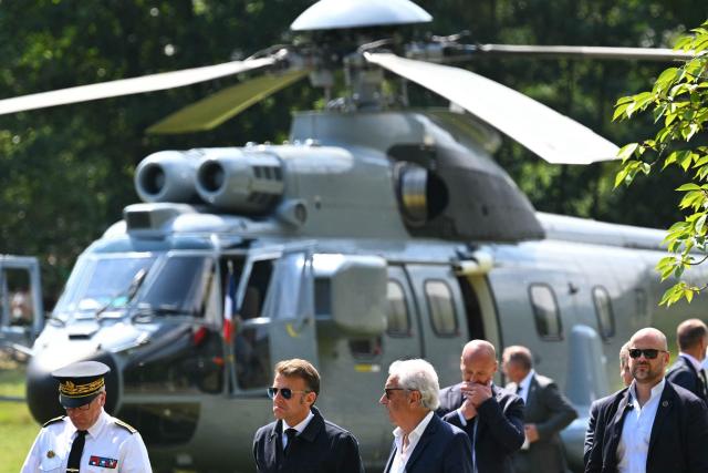 France's President Emmanuel Macron (2ndL) arrives to visit sports facilities in Loudenvielle, south-western France, on July 10, 2026. (Photo by Lionel BONAVENTURE / POOL / AFP)
