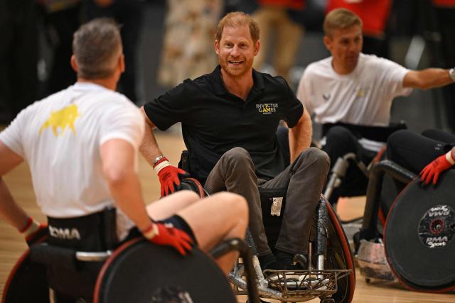 Britain's Prince Harry, Duke of Sussex, reacts as he takes part in a wheelchair Rugby session during an event to mark the 'Invictus Games Birmingham 2027: One Year To Go', at the NEC in Birmingham, central England on July 10, 2026. (Photo by Oli SCARFF / AFP)