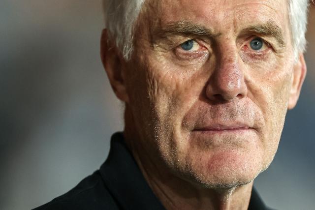 (FILES) South Africa's head coach Hugo Broos looks on ahead of the Africa Cup of Nations (CAN) 2024 quarter-final football match between Cape Verde and South Africa at the Stade Charles Konan Banny in Yamoussoukro on February 3, 2024. Candidates, including Pitso Mosimane, have applied to succeed Hugo Broos as coach of South Africa after the exit of the Belgian was confirmed, a national football association official told AFP on July 10. "Hugo may continue to work with the national team, but in a different capacity," said the insider, who requested anonymity as he is not an official spokesperson. (Photo by FRANCK FIFE / AFP)