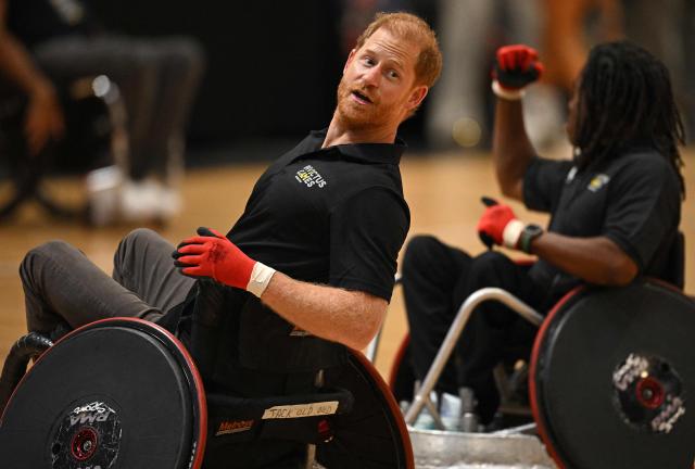 Britain's Prince Harry, Duke of Sussex, reacts as he takes part in a session of wheelchair rugby during an event to mark the 'Invictus Games Birmingham 2027: One Year To Go', at the NEC in Birmingham, central England on July 10, 2026. (Photo by Oli SCARFF / AFP)