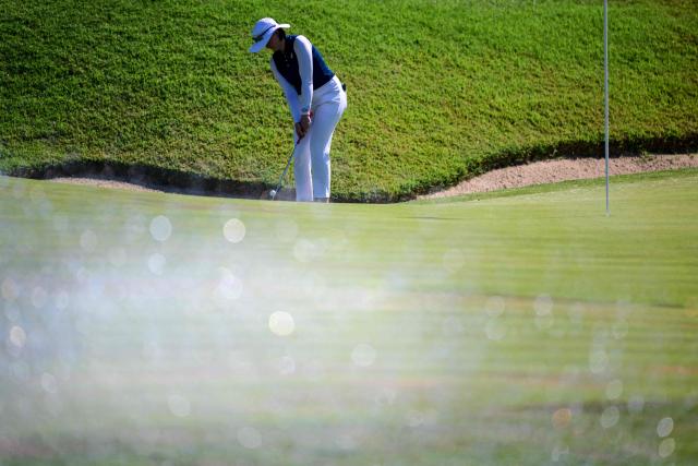 Australia's Karis Anne Davidson competes in the second round of the Amundi Evian Championship at Evian Resort Golf Club, in Evian-Les-Bains, center eastern France on July 9, 2026. (Photo by OLIVIER CHASSIGNOLE / AFP)